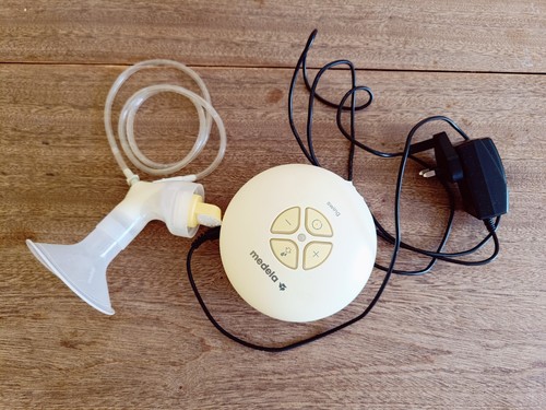 Medela swing breast pump with - medela,